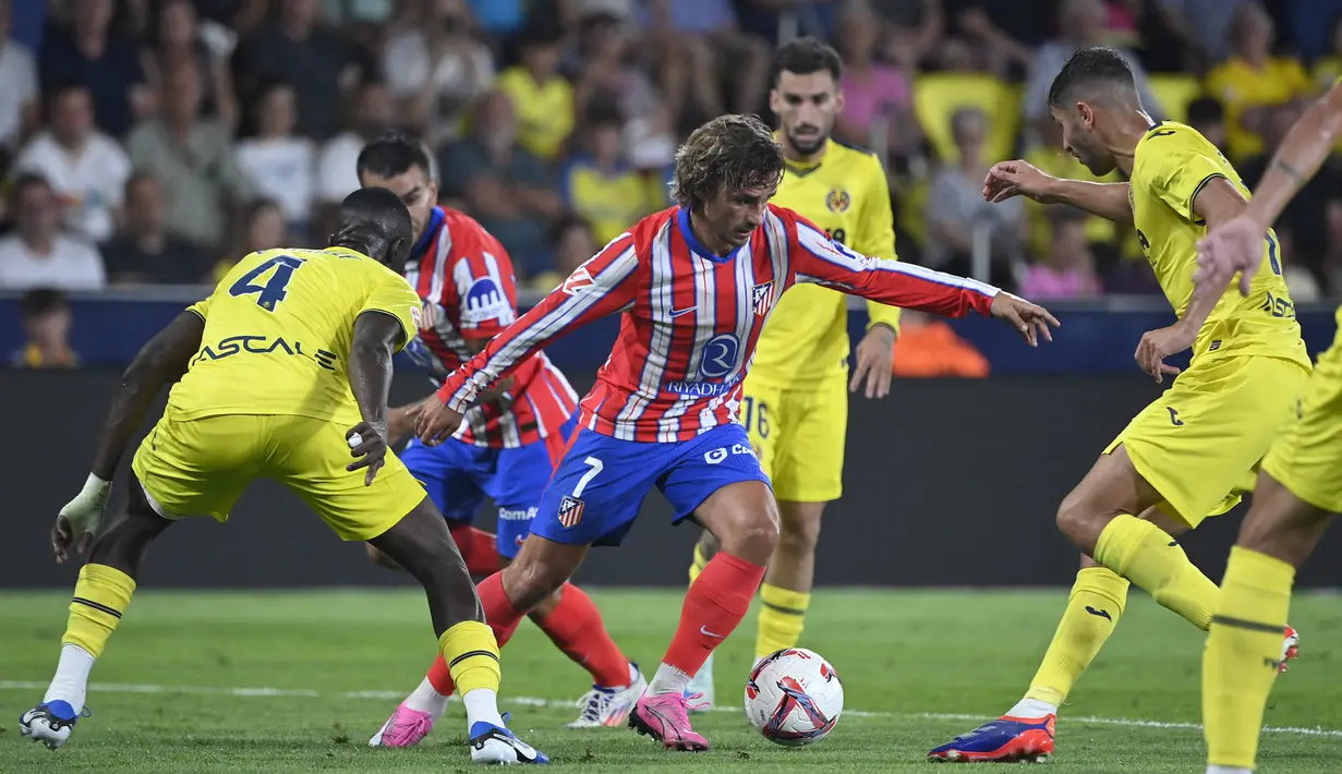 Namun, dua menit berselang Atletico membalas via Marcos Llorente. (JOSE JORDAN / AFP)