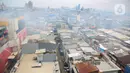 Hingga Kamis (16/1/2025), personel dari Dinas Penanggulangan Kebakaran dan Penyelamatan (Gulkarmat) Jakarta masih terus berupaya melakukan upaya pendinginan. (Liputan6.com/Angga Yuniar)