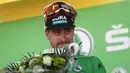 Pebalap sepeda Slovakia Peter Sagan merayakan kemenangannya pada etape kelima Tour de France di Colmar, Prancis, Rabu (10/7/2019). Peter Sagan menjuarai etape kelima Tour de France setelah melewati rute sepanjang 175,5 Km dari Saint-Dié-des-Vosges ke Colmar. (AP Photo/Thibault Camus)