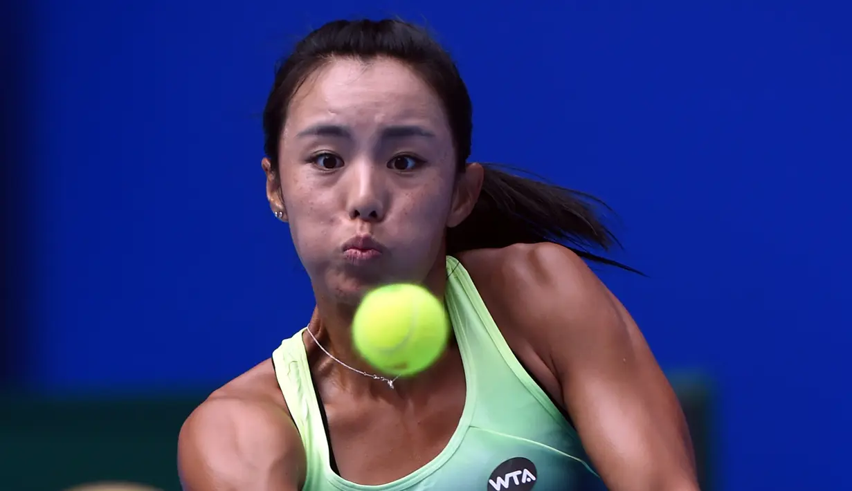 Petenis Wang Qiang asal China saat beraksi di China Open tennis tournament, Beijing, Selasa (06/10/2015). (AFP Photo / Wang Zhao)