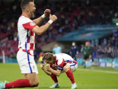 Tiga gol Kroasia yang diborong oleh Nikola Vlasic, Luka Modric, dan Ivan Perisic membuat Skotlandia tersingkir dari ajang Euro 2020 karena terdampar di dasar grup dengan nilai satu. (Foto: AP/Pool/Petr David Josek)