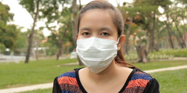 Pakai masker bisa cegah terserang flu/copyright iStock.com