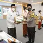 Polda Jawa Timur meluncurkan Gerakan Santri Bermasker. (Dian Kurniawan/Liputan6.com)