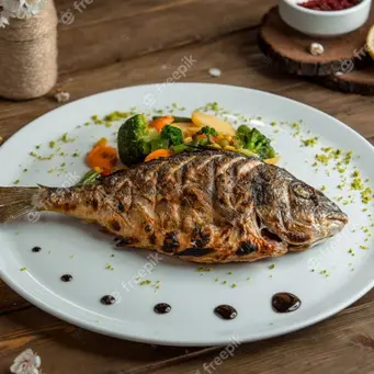 Ilustrasi ikan nila bakar, resep, masakan. (Photo by KamranAydinov on Freepik)