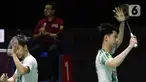 Pebulu tangkis ganda putra Indonesia, Marcus Fernaldi Gideon/Kevin Sanjaya Sukamulio usai bertanding melawan Liang Wei Keng/ Wang Chang (China) pada babak Semifinal Indonesia Masters 2022 di Istora Senayan, Jakarta, Sabtu (11/6/2022). Kevin/Marcus takluk dan gagal melaju ke final Indonesia Masters 2022. (Liputan6.com/Helmi Fithriansyah)