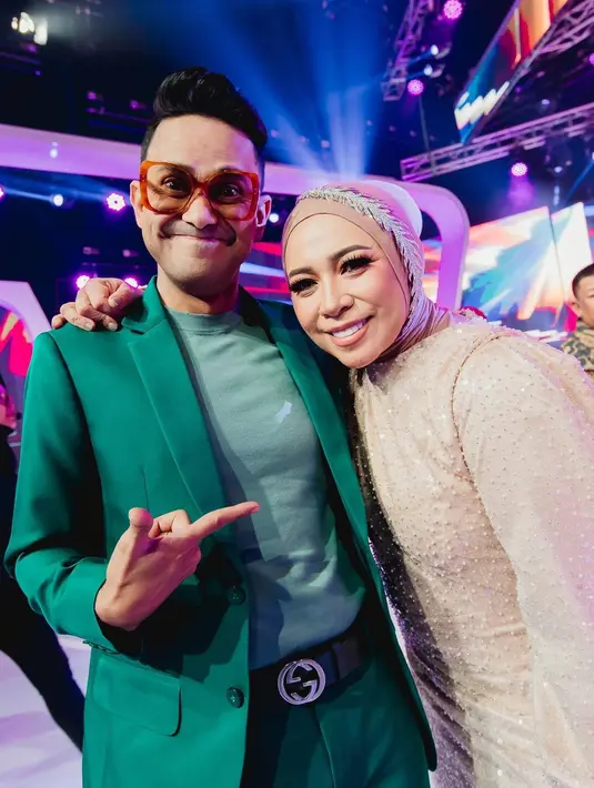 <p>Tak hanya Andien. Jeffry Waworuntu juga memiliki pendapat yang sama. "Pangling Badannya &hellip; good job Mel," ungkapnya. (Foto: Instagram/ melly_goeslaw)</p>