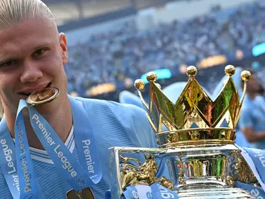Erling Haaland belum lama ini memperpanjang kontraknya bersama Manchester City. Haaland sepakat untuk berseragam biru muda hingga 9,5 tahun ke depan. (AFP/Oli Scarff)