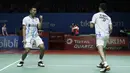 Ganda putra Indonesia, Fajar Alfian/Muhammad Rian Ardianto, merayakan kemenangan atas ganda China, Huang Kai Xiang/Liu Cheng, pada Blibli Indonesia Open 2019 di Istora Senayan, Jakarta, Rabu (17/7). Fajar/Rian menang 18-21, 21-14, 21-16. (Bola.com/Yoppy R