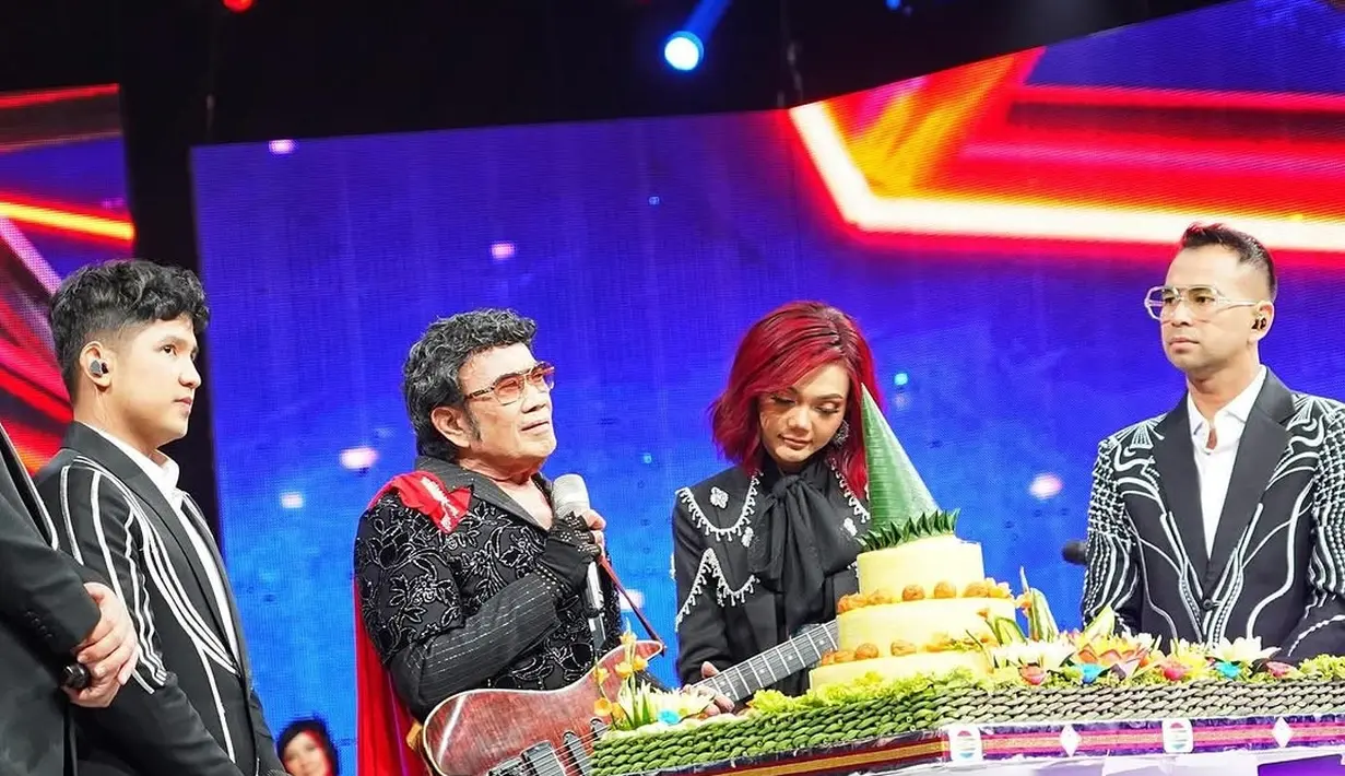 Dalam unggahannya di Instagram, Raffi Ahmad menyampaikan doa terbaik untuk Rhoma Irama. Raffi berharap agar sang legenda terus berkarya dan menginspirasi generasi muda dengan suara emas dan karya-karyanya. Ucapan tersebut disertai dengan rasa terima kasih atas kontribusi Rhoma dalam mewarnai industri musik dangdut di Tanah Air. (Liputan6.com/IG/@raffinagita1717)