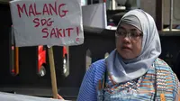 Seorang pegiat antikorupsi prihatin dengan penyakit korupsi yang menggerogoti Kota Malang, Jawa Timur (Zainul Arifin/Liputan6.com)