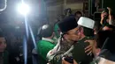 Suryadharma Ali tak mampu membendung air matanya saat hadir di Mukernas PPP, Bogor, Kamis (24/4/2014) (Liputan6.com/Johan Tallo).