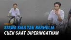 Bukannya merasa bersalah, siswa SMA itu malah cuek dan bersandar di stang motor.