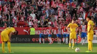 Pemain Girona merayakan gol yang dicetak Portu ke gawang Barcelona dalam laga jornada 34 La Liga Spanyol di Estadi de Montilivi, Minggu (5/5/2024) dini hari WIB. Girona menang 4-2 atas Barcelona dalam laga ini. (LLUIS GENE / AFP)