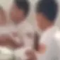 Video sepasang pelajar SMP tengah bercumbu di ruangan kelas yang penuh siswa viral di media sosial. Diduga video tersebut diambil di ruangan kelas salah satu SMP negeri di Baubau, Sulawesi Tenggara saat tidak ada guru. (Liputan6.com/ Ist)