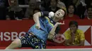 Ganda putra Indonesia, Marcus Gideon, melakukan smash saat melawan ganda Jerman pada Indonesia Masters 2019 di Istora Senayan, Jakarta, Rabu (23/1). Kevin / Marcus lolos ke 16 besar. (Bola.com/M. Iqbal Ichsan)