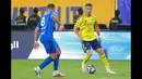 Bermain sebagai starter, Al Nassr berhasil unggul terlebih dahulu pada menit ke-37 melalui gol Mohamed Simakan. (AFP/Fayez Nureldine)