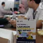 Direktorat Jenderal Pajak memberikan bantuan dengan mengirim petugas langsung ke Gedung DPR. (Liputan6.com/Johan Tallo)