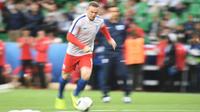 Striker tim nasional Inggris, Wayne Rooney. (AFP/Jeff Pachoud)