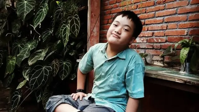 Wahyu Nizam Arden Abhista penyandang Down syndrome asal Malang. Foto: Dok. Pribadi.
