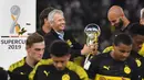 Prestasi terbaik Lucien Favre bersama Dortmund adalah memberi trofi Piala Super Jerman pada 2019. Mereka mengangkat piala itu setelah mengalahkan Bayern Munchen. (Foto: AFP/Ina Fassbender)