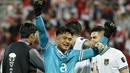 <p>Kiper Timnas Indonesia, Ernando Ari merayakan kemenangan timnya atas Vietnam pada laga Grup D Piala Asia 2023 di Abdullah bin Khalifa Stadium, Doha, Qatar, Jumat (19/01/2024). (AFP/Karim Jaafar)</p>