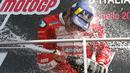 Pembalap Ducati, Danilo Petrucci menyemprotkan sampanye merayakan kemenangan Grand Prix MotoGP Italia di sirkuit Mugello (2/6/2019). Petrucci berhasil menjadi juara MotoGP Italia 2019 disusul Marc Marquez (Honda) urutan kedua, dan Andrea Dovizioso (Ducati) di urutan ketiga.(AP Photo/Antonio Calanni)
