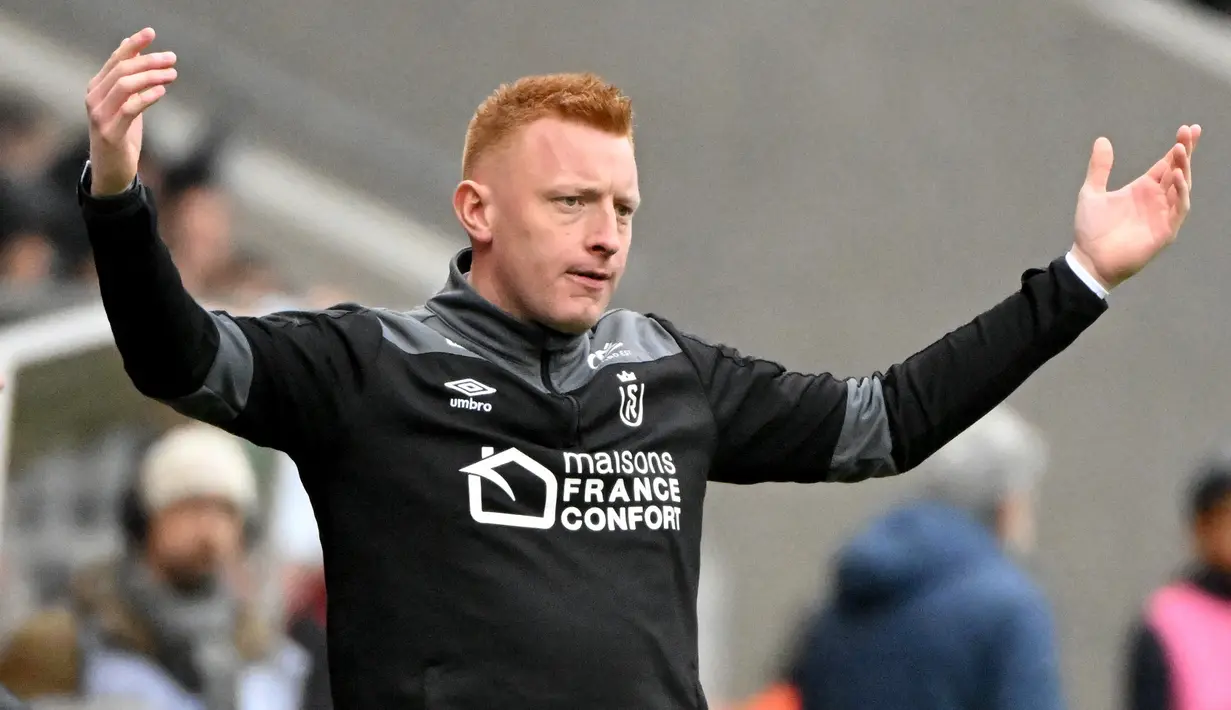 William Still yang sebelumnya manjadi asisten pelatih Stade Reims ditunjuk menjadi pelatih kepala menggantikan Oscar Garcia pada 13 Oktober 2022 saat tim berada di zona degradasi. Kini, hingga pekan ke-32 Stade Reims melesat ke posisi ke-8 dari 20 tim di Liga Prancis 2022/2023. (AFP/Francois Lo Presti)