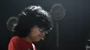 Pianis belia asal Indonesia, Joey Alexander saat latihan bermain piano di Prancis, 10 Agustus 2015. Pianis jazz berusia 12 tahun itu menjadi musisi pertama asal Tanah Air yang masuk nominasi ajang Grammy Awards 2016.  (AFP PHOTO/PASCAL Pavani)