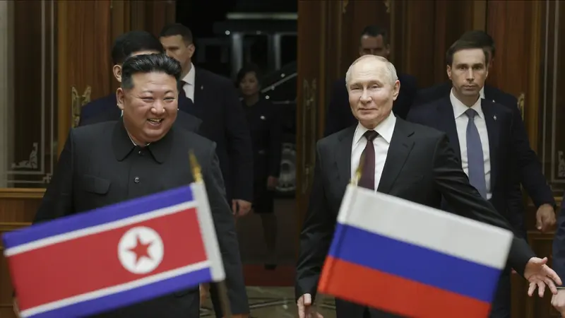 Vladimir Putin dan Kim Jong Un di ibu kota Korea Utara pada Rabu (19/6/2024).