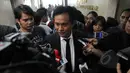 Kuasa hukum DPP Golkar kubu Aburizal, Yusril Ihza Mahendra mendatangi ruang Fraksi Golkar untuk melakukan pertemuan tertutup dengan Koalisi Merah Putih (KMP) di Gedung Nusantara I DPR, Jakarta, Rabu (25/3/2015). (Liputan6.com/Andrian M Tunay)