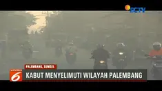 Kabut yang menyelimuti Palembang, Sumatera Selatan, mengakibatkan transportasi darat dan laut sulit beroperasi.
