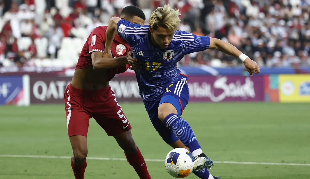 Kuryu Matsuki menjadi salah satu pemain Timnas Jepang U-23 yang berperan penting dalam gelar juara Piala Asia U-23 2024. Pemain yang berposisi sebagai gelandang tersebut tak tergantikan di lini tengah dengan total bermain 321 menit dalam enam laga. Ia juga sukses mencatatkan satu gol saat laga pembuka Grup B melawan China. (AFP/Karin Jaafar)