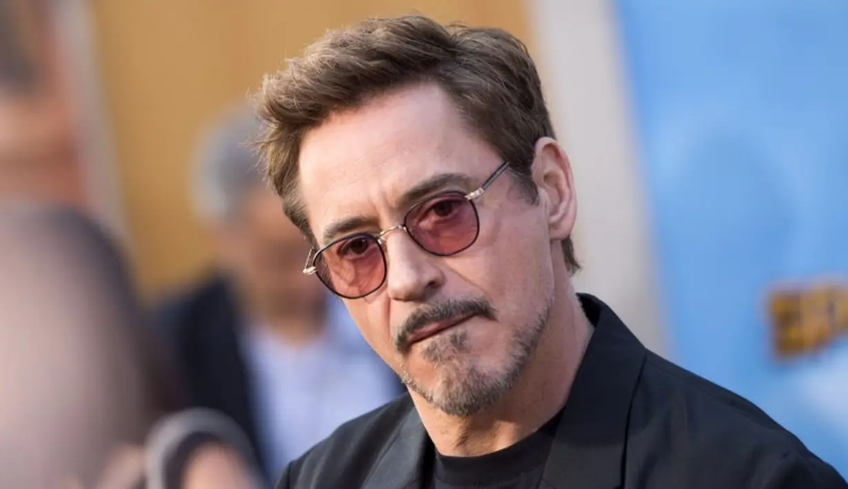 Terkenal usai membintangi Iron Man, Robert Downey Jr dahulu adalah seorang pecandu narkoba yang pernah masuk penjara. (VALERIE MACON  AFP)