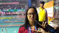 Perenang Kalimantan Utara, Angel Gabriella Yus, memecahkan rekor PON dan nasional saat meraih medali emas nomor 100 meter gaya kupu-kupu putri PON 2016 di Kolam Renang FPOK UPI, Bandung, Jawa Barat, Kamis (15/9/2016). (Tim Media PON 2016)