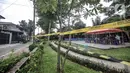 Suasana lokasi tes usap PCR warga di Taman Pintar, Kayu Putih, Pulogadung, Jakarta Timur, Selasa (8/6/2021). Saat ini, RW 09 dan 10 Kelurahan Kayu Putih dalam status zona merah atau karantina wilayah sejak 4 Juni setelah 22 orang terkonfirmasi positif COVID-19. (merdeka.com/Iqbal S. Nugroho)