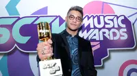 Afgan keluar sebagai pemenang Penyanyi Solo Pria Paling Ngetop di SCTV Music Awards 2017. (Deki Prayoga/Bintang.com)