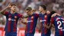 Keunggulan 2-1 untuk Barcelona bertahan hingga laga usai. (JORGE GUERRERO/AFP)