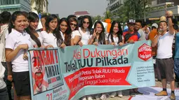 Sejumlah massa dari berbagai organisasi ini menolak RUU PILKADA yang akan dilakukan melalui DPRD, Jakarta, Minggu (21/9/2014) (Liputan6.com/Faizal Fanani)