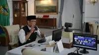 Gubernur Jawa Barat Ridwan Kamil membuka secara virtual pertemuan nasional Masika - ICMI dari Gedung Pakuan Kota Bandung, Sabtu (21/8/2021). (Foto: Biro Adpim Jabar)