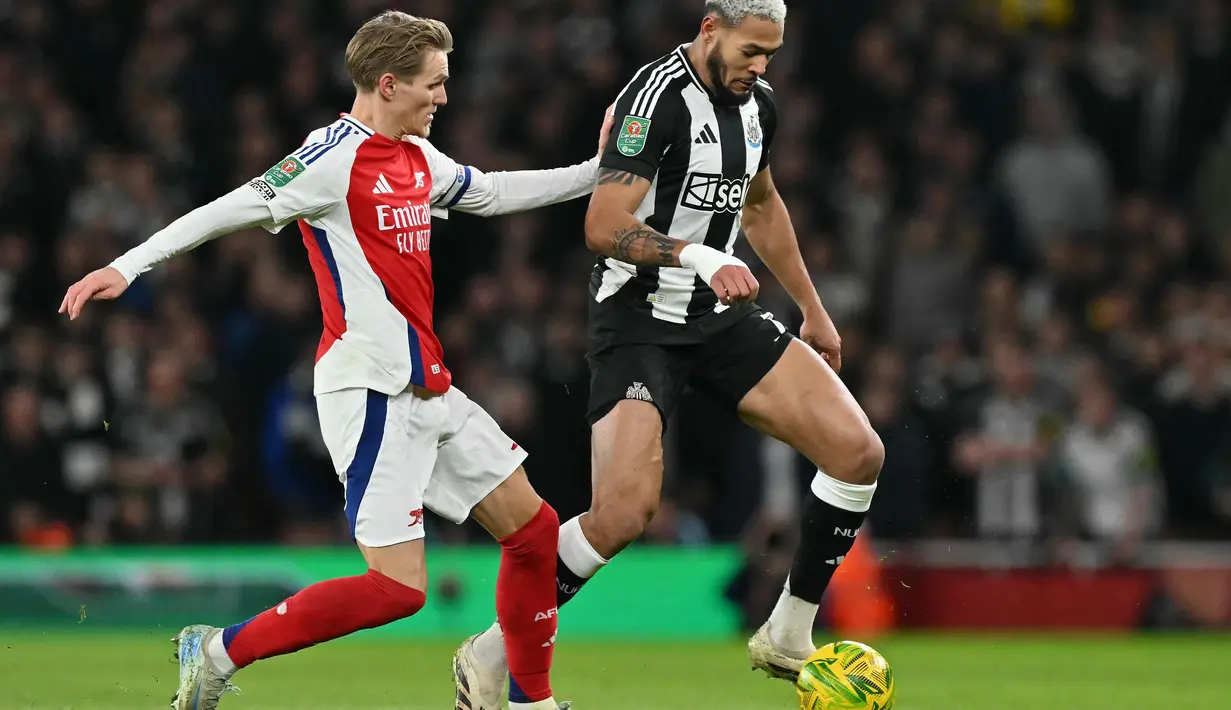 Keunggulan Newcastle United atas Arsenal bertahan hingga akhir pertandingan. (Glyn KIRK/AFP)
