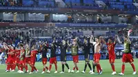 Para pemain Belgia merayakan kemenangan atas Inggris pada laga grup G Piala Dunia di Stadion Kaliningrad, Kaliningrad, Rabu (28/6/2018). Belgia menang 1-0 atas inggris. (AP/Hassan Ammar)