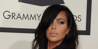Usai melahirkan buah hati kedua dari benih cintanya bersama Kanye West tahun 2015 lalu, Kim Kardashian merasa tidak puas dengan bentuk tubuhnya yang dianggap terlalu gemuk. (AFP/Bintang.com)