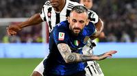 Marcelo Brozovic sukses mengatur tempo permainan Inter Milan. Ia juga mampu memenangkan penguasaan bola di lini tengah saat pertandingan. (AFP/Isabella Bonotto)