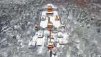 Pemandangan dari atas saat Taman Beiling diselimuti salju di Shenyang di provinsi Liaoning, China (15/3). Usai hujan salju, Taman Beiling diselimuti salju tebal. (AFP)