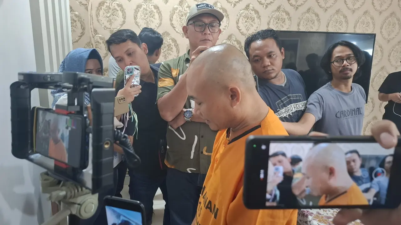 AT, tersangka penipuan dan penggelapan dana KKL 106 mahasiswa FKIP Unila. Foto : (Liputan6.com/Ardi).