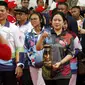 Menteri Menko PMK  Puan Maharani menjadi salah satu pembawa obor dalam torch relay Asian Para Games di Solo.(Liputan6.com/Fajar Abrori)