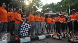 Kapolda Metro Jaya, Irjen Pol Tito Karnavian meluncurkan Satuan Segway Direktorat Pengaman Objek Vital di Bundaran HI, Jakarta, Minggu (13/9/2015). Sebanyak 7 segway baru dipakai untuk pengamanan jalannya car free day. (Liputan6.com/Gempur M Surya)