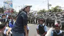 Seorang wanita pendukung oposisi meneriakkan slogan-slogan menentang Presiden Nikaragua, Daniel Ortega, di depan Dewan Pemilihan Agung (CSE) Managua , Nikaragua, (8/7/ 2015). Mereka berdemonstrasi untuk menuntut pemilu yang adil. (REUTERS/Oswaldo Rivas)