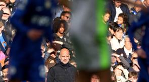 Manajer Manchester City, Pep Guardiola, berhasil membawa anak asuhnya meraih kemenangan 3-0 atas Chelsea pada laga pekan ke-32 Premier League musim ini di Stamford Bridge, Minggu (12/04/2026) malam WIB. (AFP/Adrian Dennis)