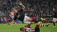 Manchester United's Luke Shaw goes down injured after this challenge from PSV's Hector Moreno Action Images via Reuters / Andrew Couldridge